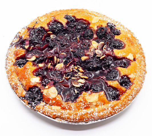 A delicious hand-baked traditional blackberry and almond tart