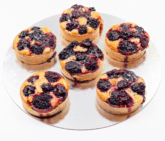 Six delicious raspberry and almond tartlets